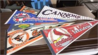 Six sports pennants including St. Louis