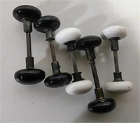 Five porcelain door knobs