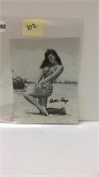 BETTIE PAGE HAND SIGNED BOOK PHOTO