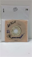 DOOBIE BROTHERS HAND SIGNED BY 5 C. 1980