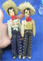 2 handmade cowboy dolls with red sashes
