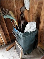 Lot Of Yard Tools In Trash Can
