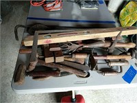 Lot of hand tools pry bars as shown