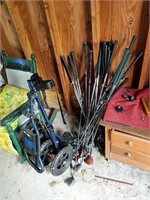 Golf clubs and cart as shown