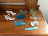 Lot of glass shoes and ashtrays as shown