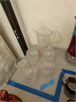 Cut glass pitcher and 5 tumblers