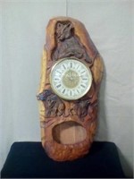 Carved wood clock