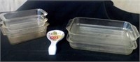Glass baking dishes, bread pans, and spoon rest