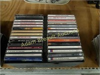 52 assorted music CDs