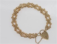 Hallmarked 9ct gold bracelet with heart lock