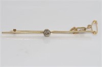 14ct yellow gold and diamond bar brooch