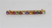 18ct yellow gold and multi-gem brooch