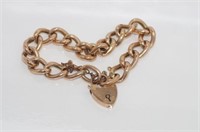 Hallmarked 9ct rose gold bracelet with heart lock