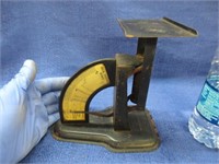 smaller black metal "ideal" postal scales