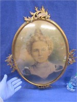 antique early 1900's portrait in oval metal frame