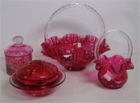 Two Fenton cranberry glass baskets