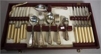 Boxed forty four piece silver plated cutlery set