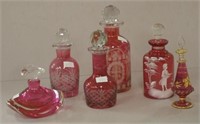 Six assorted Cranberry perfume bottles