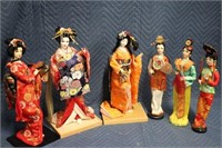 2 Sets of Asian Figurines