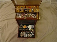 Two jewelry boxes and costume jewelry contents.
