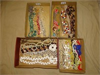 Large lot of beaded costume necklaces.
