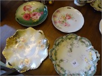 4 Porcelain plates.