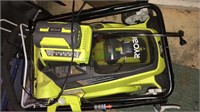 Ryobi electric lawnmower with the charger runs on