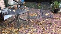 Black iron to chair and table patio set the table