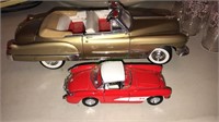 Gold Cadillac convertible diecast car in a