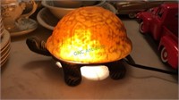 Turtle table light, glass shell illuminates