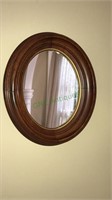 Antique oval walnut frame with mirror, 13 x 12,