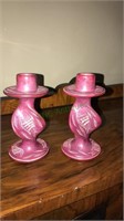 Pair of candlesticks with fish carved in them, 5