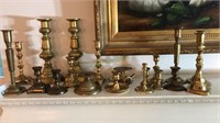 Collection of brass candlesticks from 11 inch to