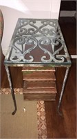 Handmade wrought iron side table with a glass