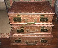 Three copper painted decorative suitcases, (FR)