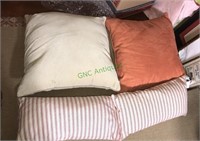 Four designer pillows, beige, orange, pair of red