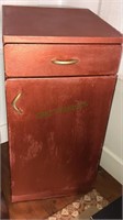 Rust red painted kitchen cabinet one drawer over