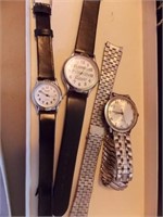 Three Timex quartz wristwatches, older one made