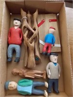 Carved, wooden people