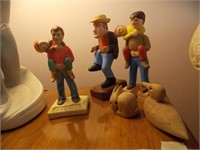 Carved wooden figures, two signed by Martin Engel