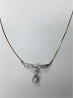 DIAMOND NECKLACE W/ .66 CARAT CENTER DIAMOND