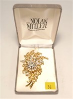 Nolan Miller dancing flower pin
