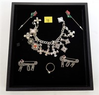 Sterling silver jewelry: bracelet, pins, charm