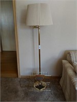 Brass lamp and vintage magazine rack