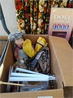 Box of vintage doll clothes and other doll