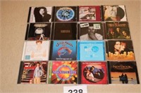 16) MUSIC CD'S