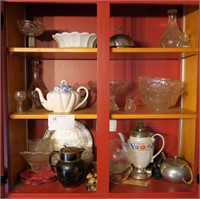 Contents of cupboard including assorted glass,