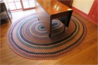 7'4" x 8' 9" oval braided rug