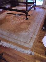Area rug shows wear 9'x12'