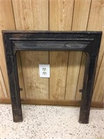 Early cast iron fireplace front